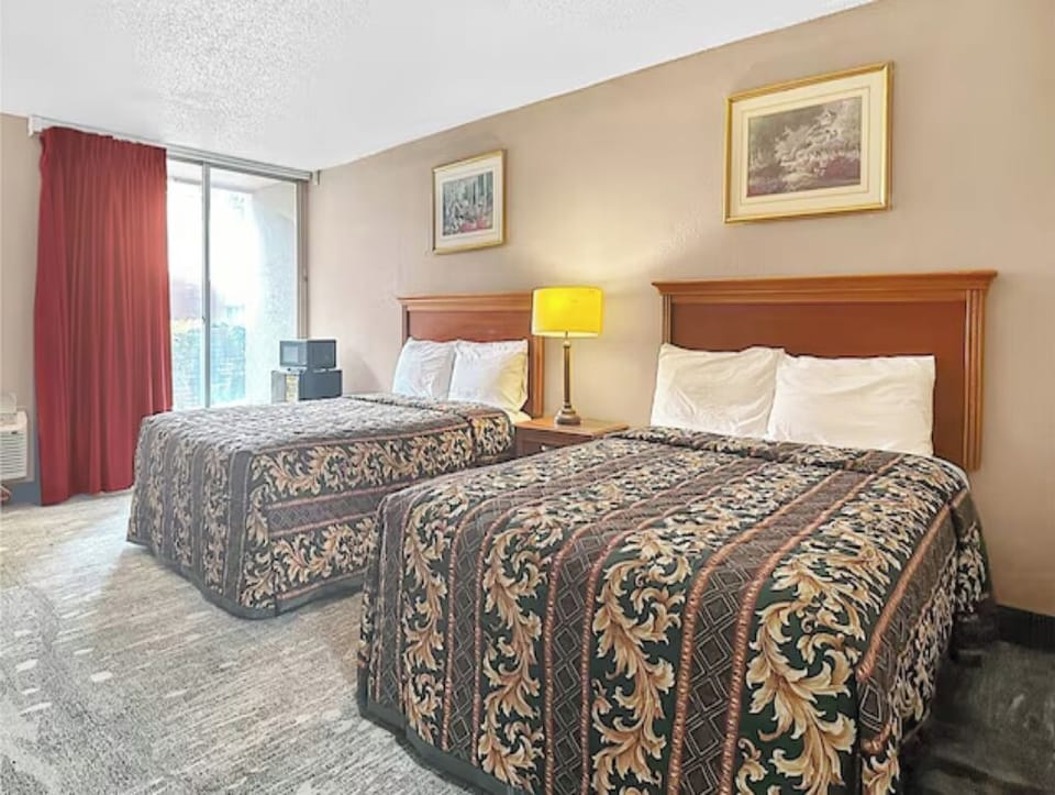 Settle into a bright room with two comfy beds.