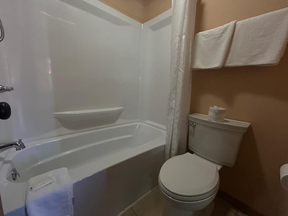 Rinse off comfortably in the bright, easy-access tub shower.