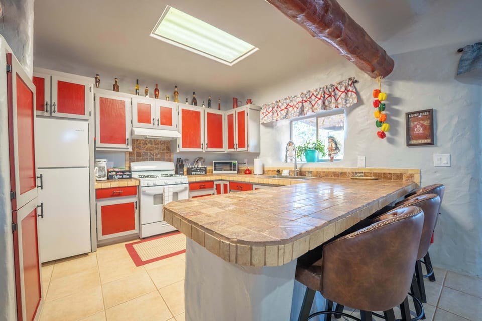 Fully Equipped Kitchen w/ Unique Handcrafted Cabinets & Ample Prep Space