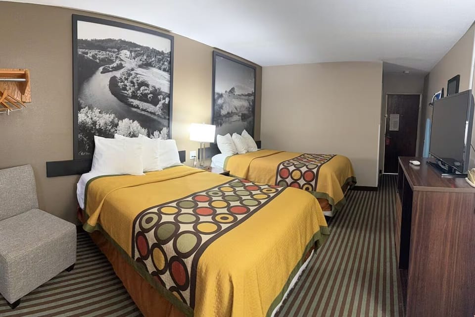 Stretch out and relax in a roomy double-queen retreat.