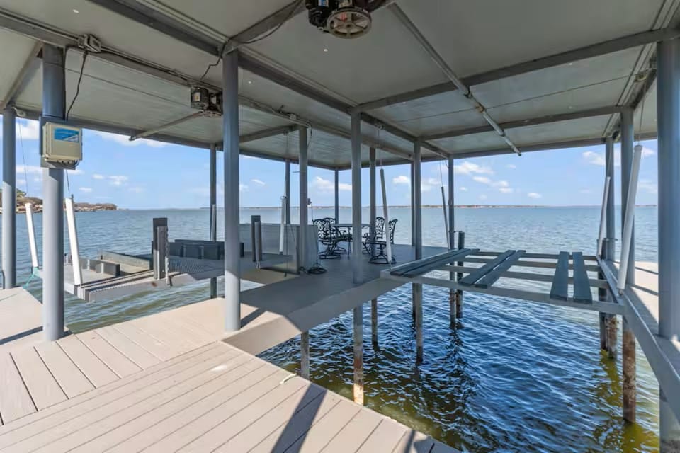 Boat and jetski lifts as well as several rod holders in various locations
