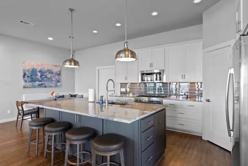 Kitchen view, includes all basic cooking items and island seating