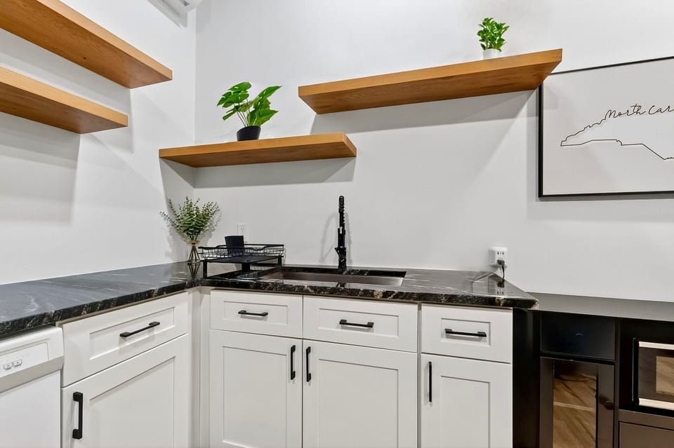 Kitchen sink and plenty of storage space