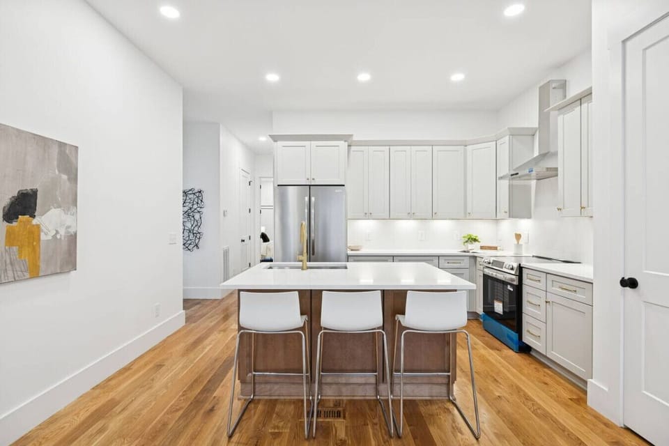 Fully-equipped, modern kitchen with stainless steel appliances for all your cooking needs! Seating at the kitchen island.