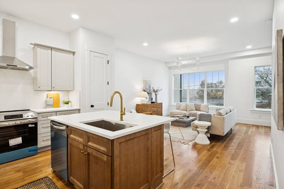 Fully-equipped, modern kitchen with stainless steel appliances for all your cooking needs! Seating at the kitchen island.