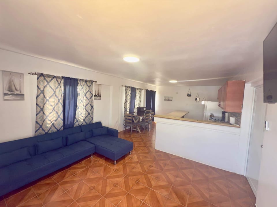 Open-concept living area, seamlessly connecting relaxation and dining.