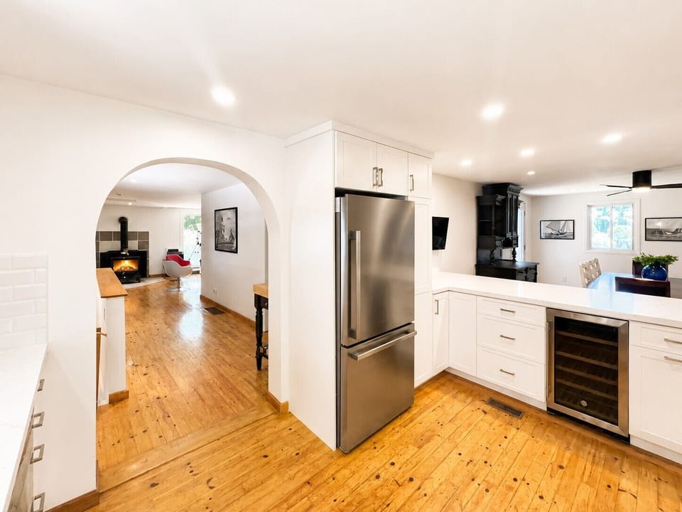 Open-Concept Kitchen with Access to Dining Room, Living Room & Lower Level