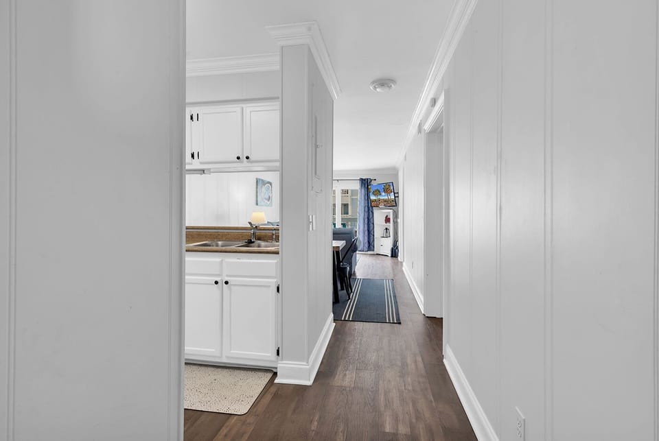 Your beach vacation awaits! (spacious condo-sleeps 13!)