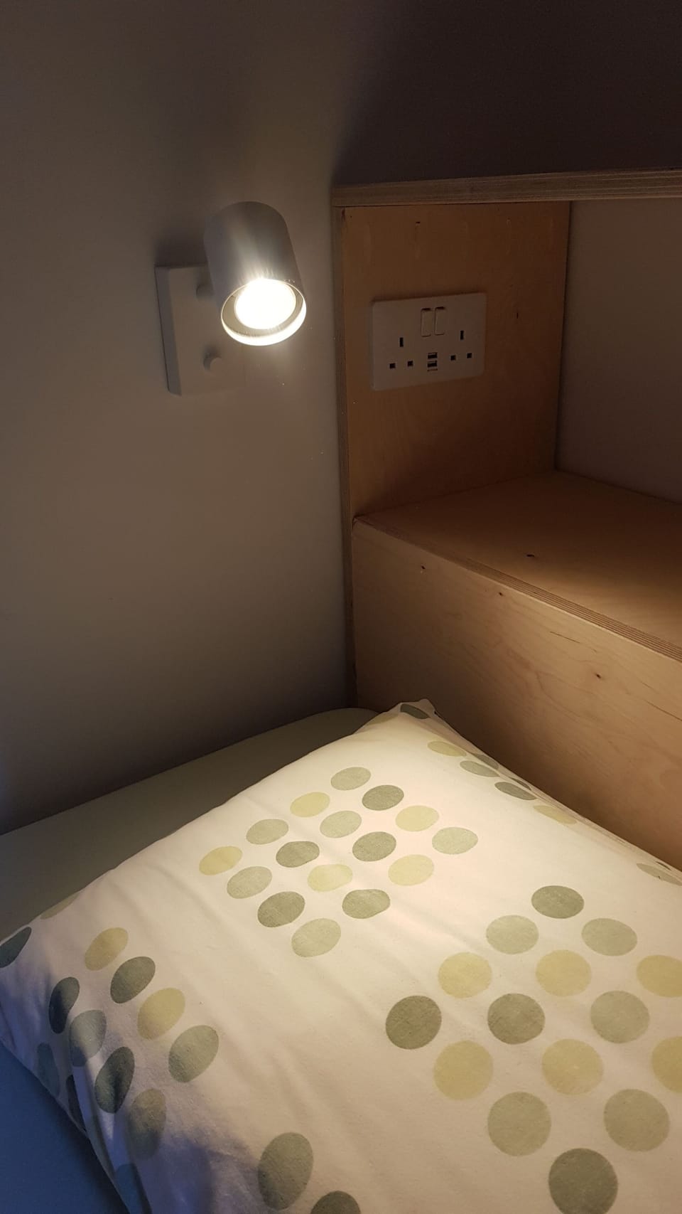 Reading light and charging sockets