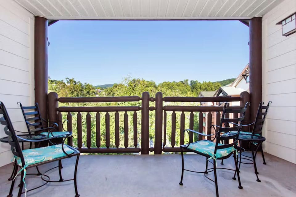 Step onto your private balcony and breathe in the fresh mountain air while enjoying panoramic views of rolling hills and lush forests.