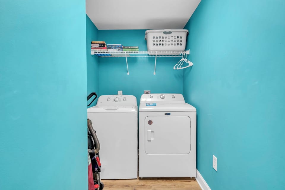Your dedicated laundry room makes extended stays effortless with full-size washer and dryer, plus convenient storage shelving for all your belongings.
