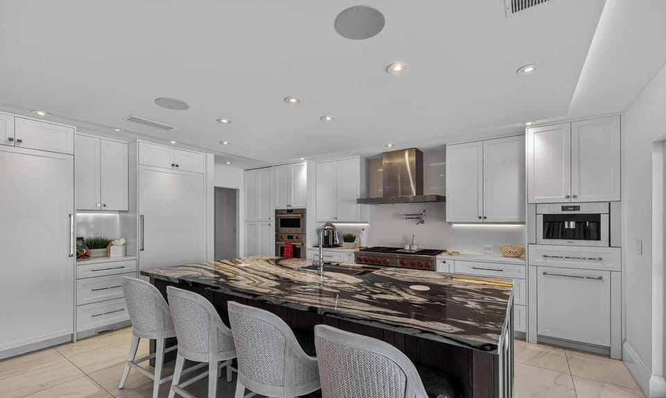 Expansive Open-Concept Chef’s Kitchen with Integrated Dining & Living Area