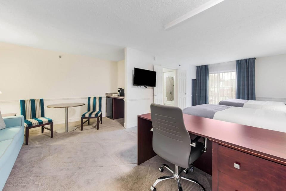 Work comfortably at the desk, then lounge steps from bed.