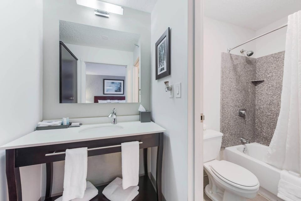 Refresh with a bright vanity and clean, modern bath.
