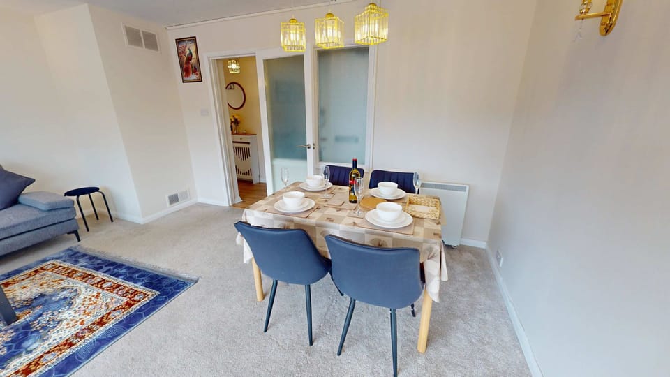 Dining Area: Elegant dining for four, perfect for sharing meals and creating memorable moments!