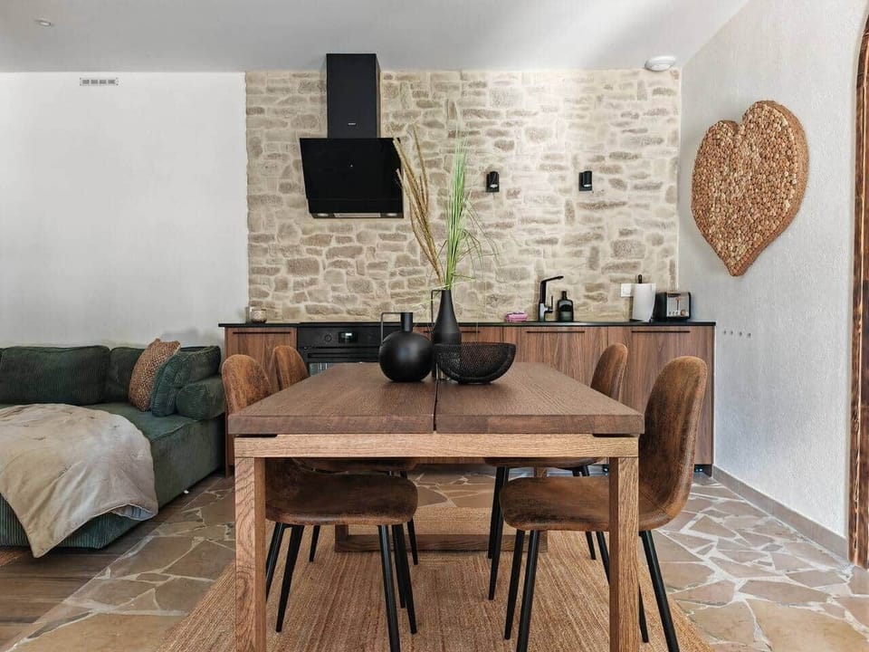 Kitchenette and dining area within the open living space