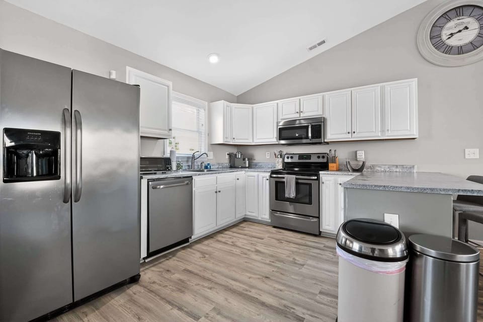 Start your mornings with ease. Brew a fresh pot of coffee in our sun-lit kitchen and enjoy the modern, clutter-free space as you plan your day’s adventures.