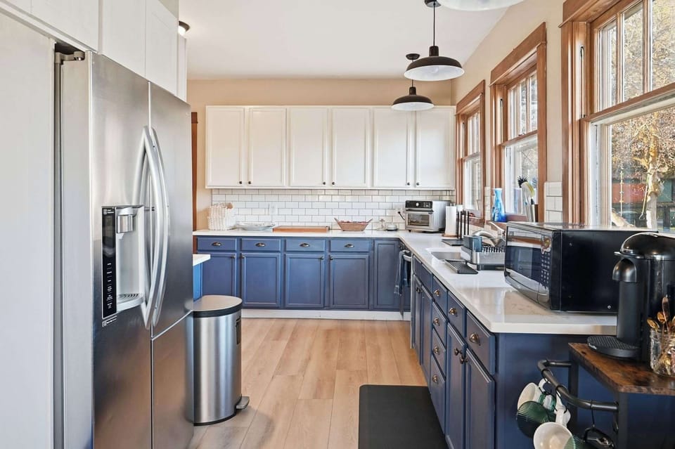 A sleek kitchen with contemporary design, clean lines, and all the essentials for a comfortable stay.
