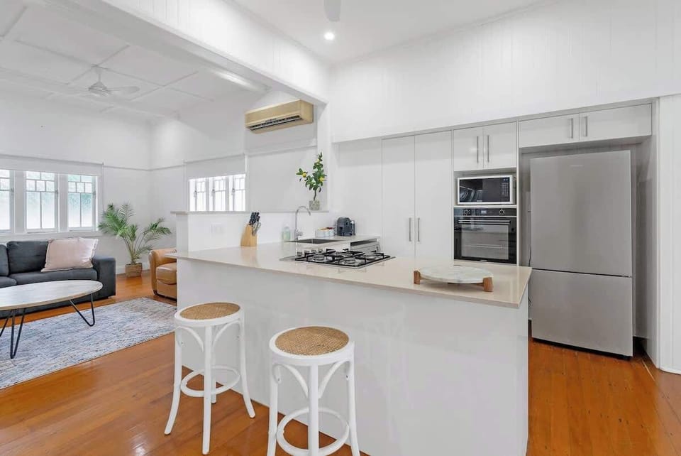 Pull up a seat at the breakfast bench, where casual dining and conversation flow easily as meals come together in the open-plan space.