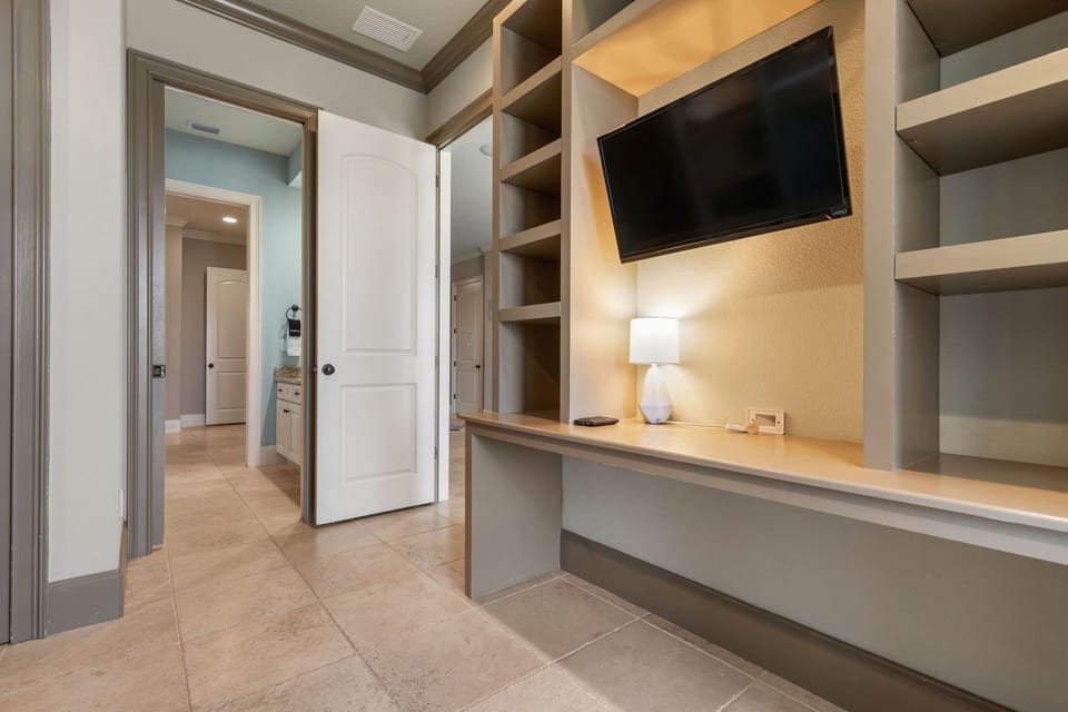 After a full day of sun and surf, settle in here to unwind with a quiet show while the house softens into evening. Just steps from family and laughter, this cozy corner becomes your own peaceful pause before tomorrow’s adventures begin.
