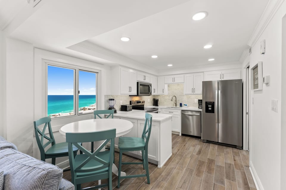 Enjoy the space in your dining area and fully equipped open kitchen.