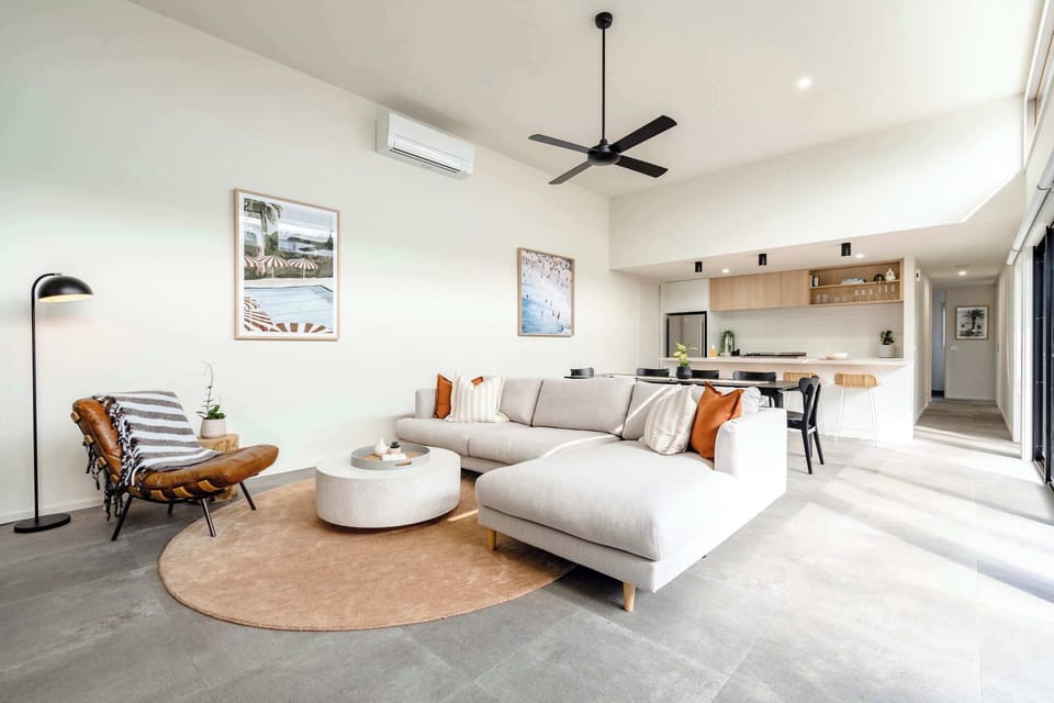 Expansive sun filled lounge room with space for all the family.