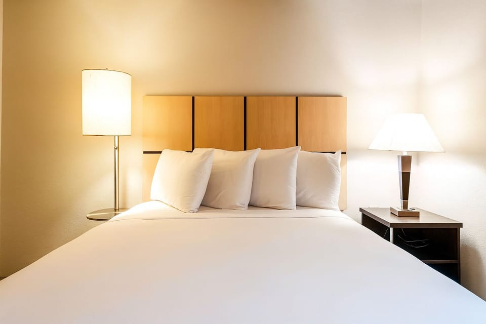 Sink into cloud-soft pillows for a deeply restful night’s sleep.