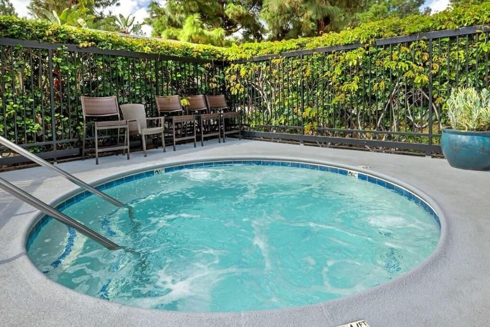 Sink into the bubbling hot tub after a busy day.
