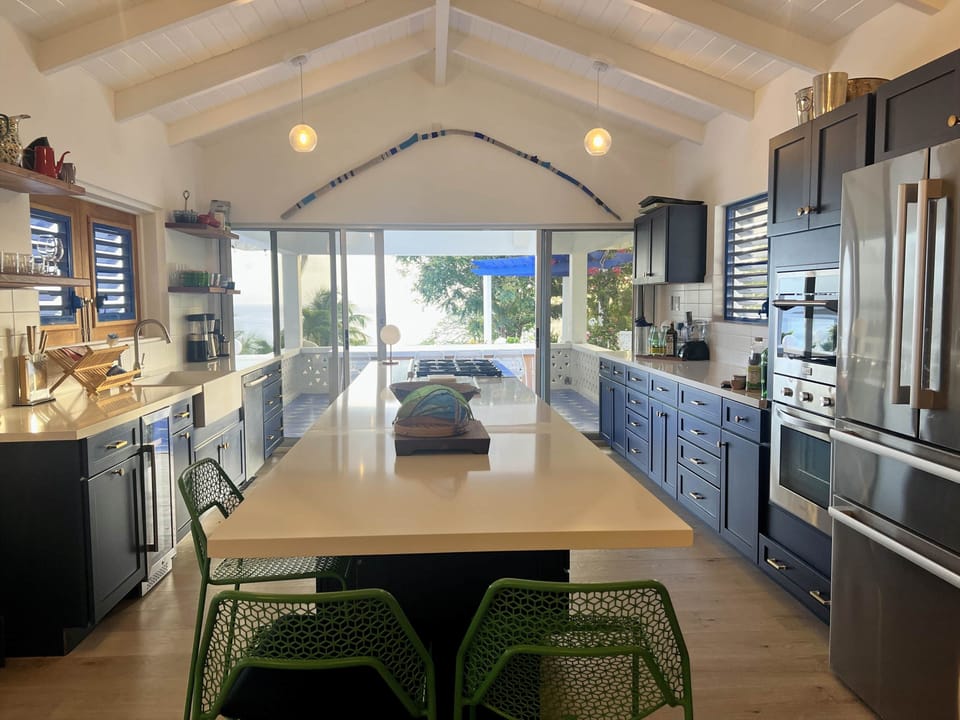 Modern kitchen with sleek appliances, ample counter space, and a bright, airy layout
