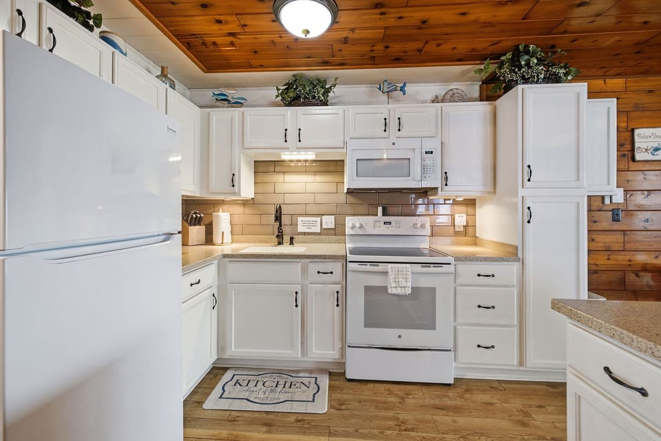 Well stocked kitchen with modern appliances makes home cooking convenient.