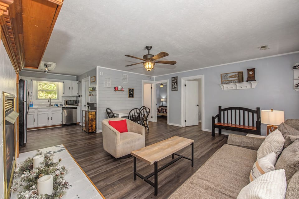 Settle into your cozy open-concept living space where modern comfort meets homey charm.