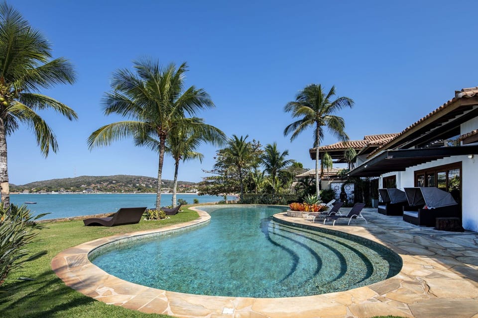 Beach,Garden,Pool view,Property building,Sea view,Swimming pool