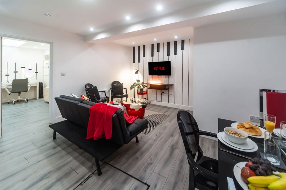 A stylish living room inspired by music in a quiet, private ground-floor apartment.
