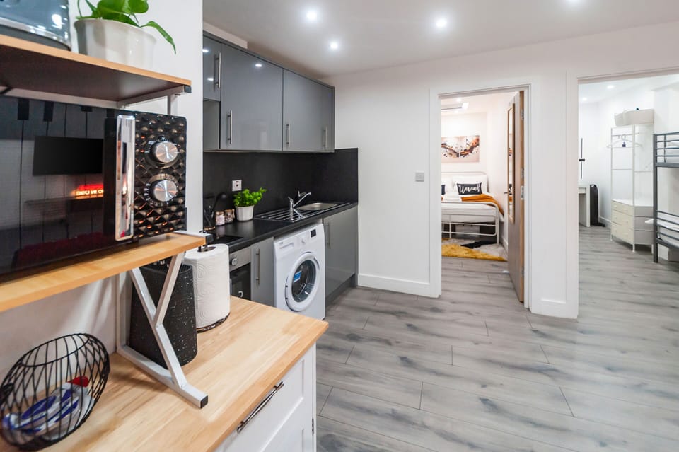 A fully equipped kitchen with all essential appliances makes this accommodation perfect for your stay.