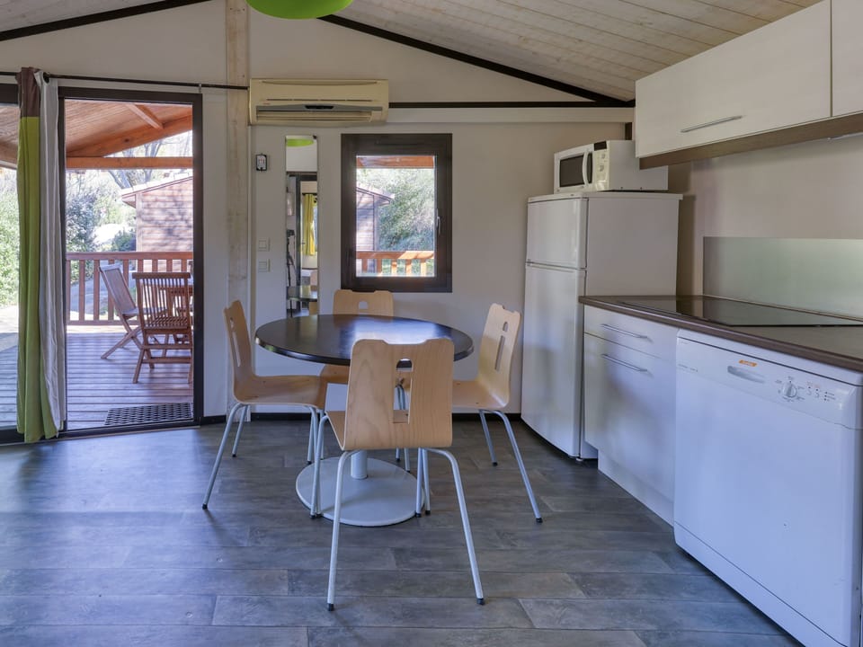 Enjoy the ease of cooking in a fully equipped kitchen, designed for comfort and convenience during your stay.