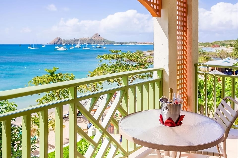 Sip sunset drinks on your balcony with sweeping ocean views.