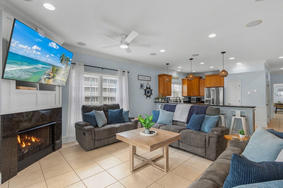 Watch a movie in the comfy living room and enjoy the fireplace in the winter months
