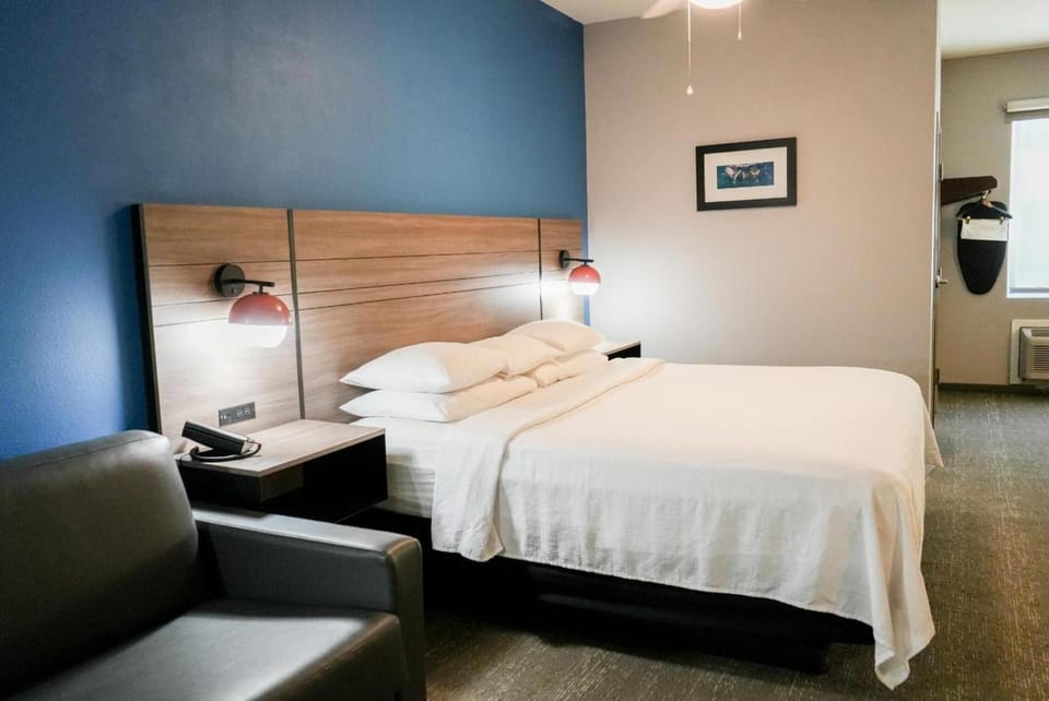 Recharge in a serene bedroom designed for effortless relaxation.