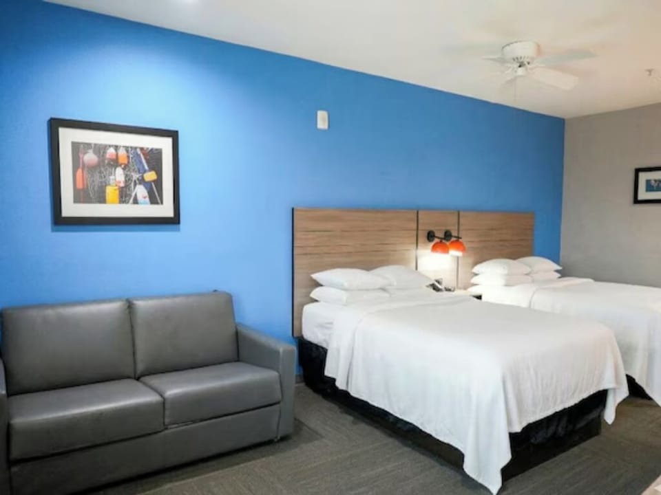 Kick back on the sofa after settling into comfy beds.