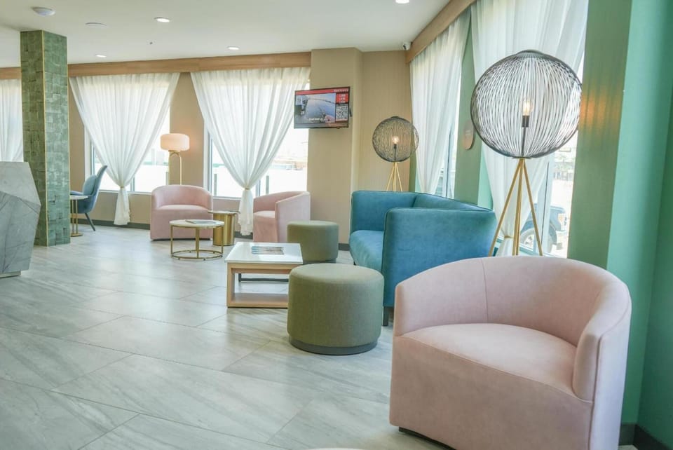 Unwind in the airy lounge with soft seating and sunshine.