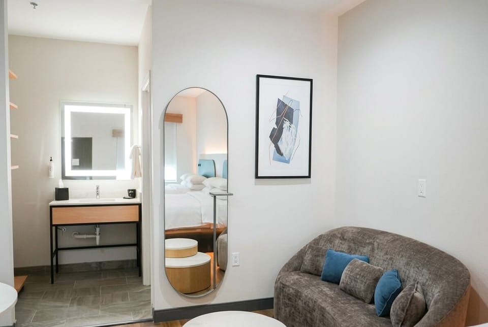 Refresh and relax with a cozy seating nook nearby.