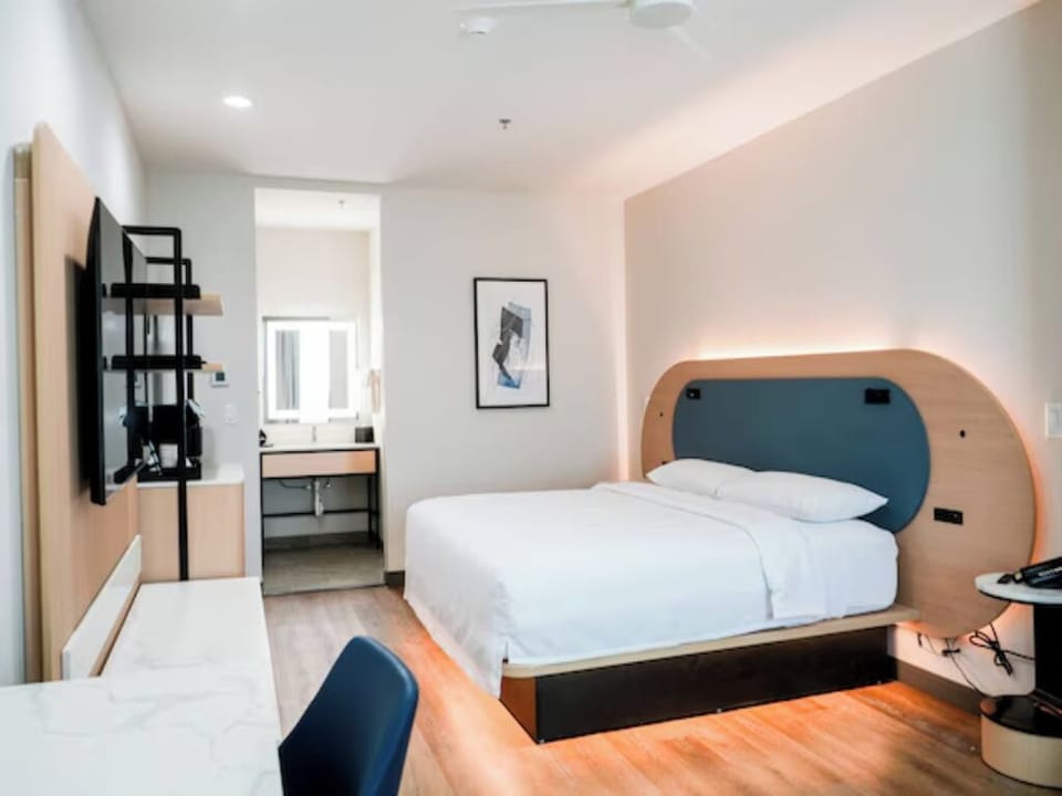 Stretch out in a modern room with warm, calming lighting.