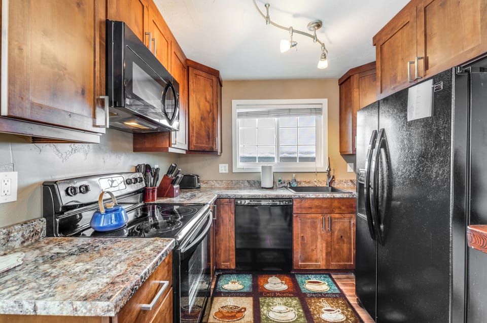 Open kitchen with everything you need for your stay.