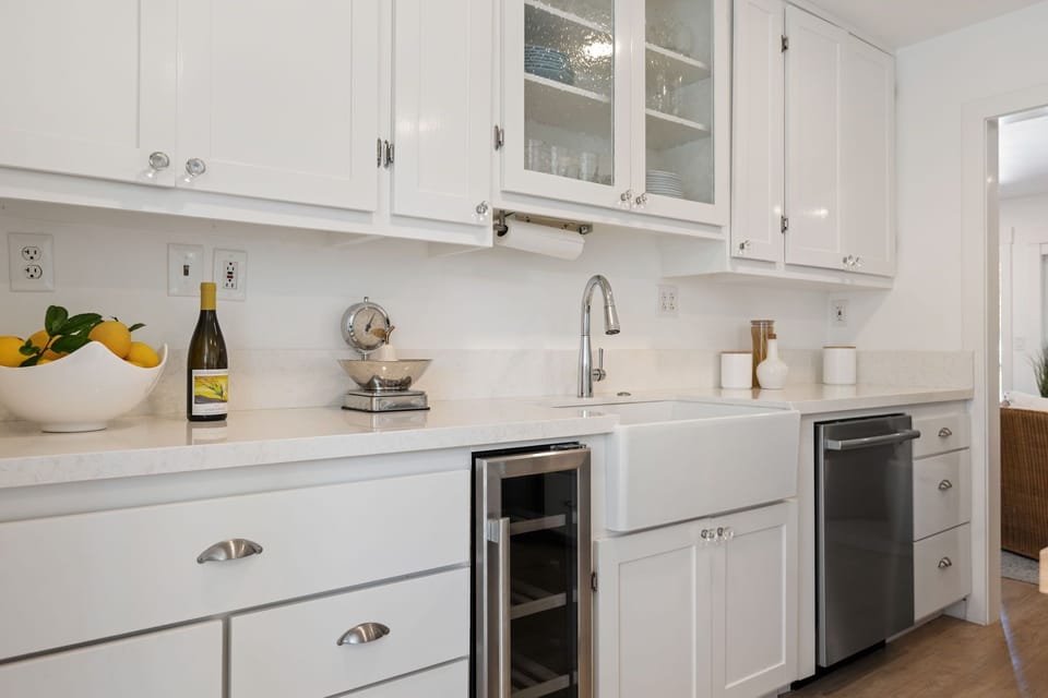 Sparkling white surfaces and even a wine fridge to chill your favorite local sips!