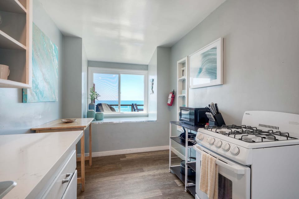 Kitchen with ocean views and modern essentials