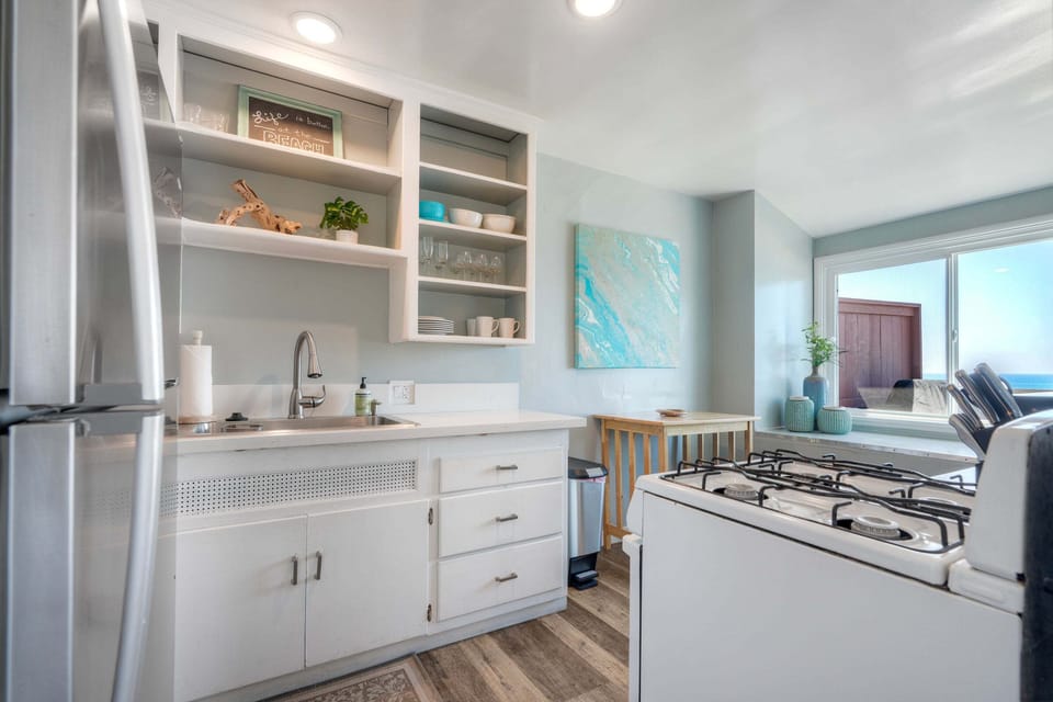 Fully stocked kitchen with open shelving