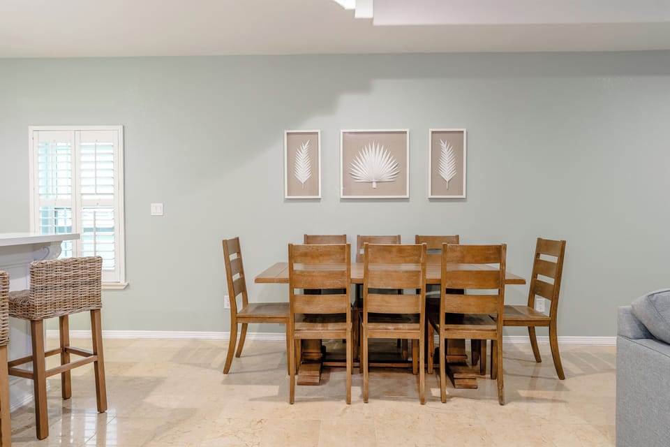 The dining table and breakfast bar will come in handy when you're feeding your crew! Book a space fit for the whole family!
