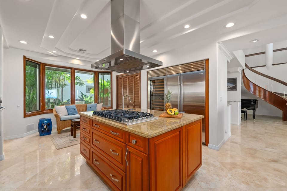 Cook and gather in a chef's kitchen designed for shared meals and effortless entertaining.