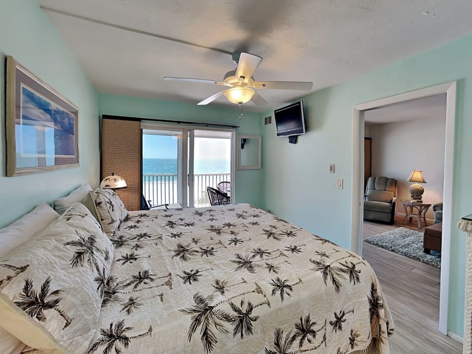 Primary Bedroom - Lanai Access + Smart TV
