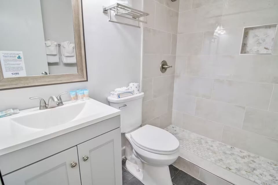 Rinse off comfortably in the clean shower with soft towels ready.